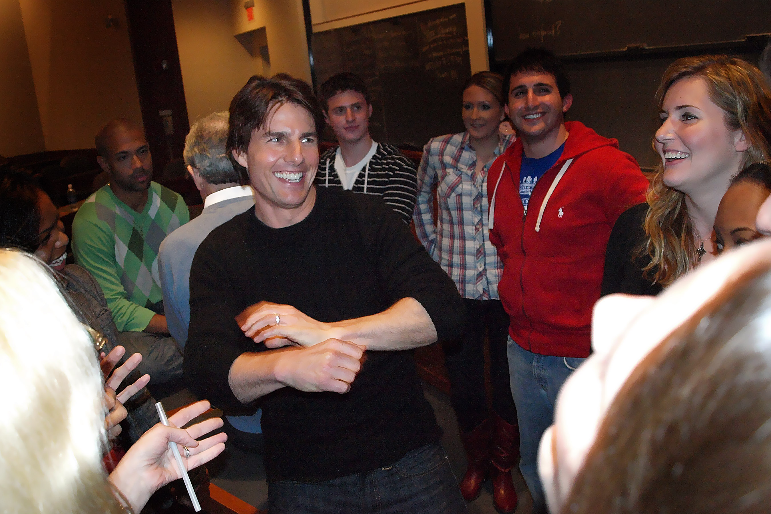 Tom Cruise seen having a laugh with Harvard Law students on October 5, 2009