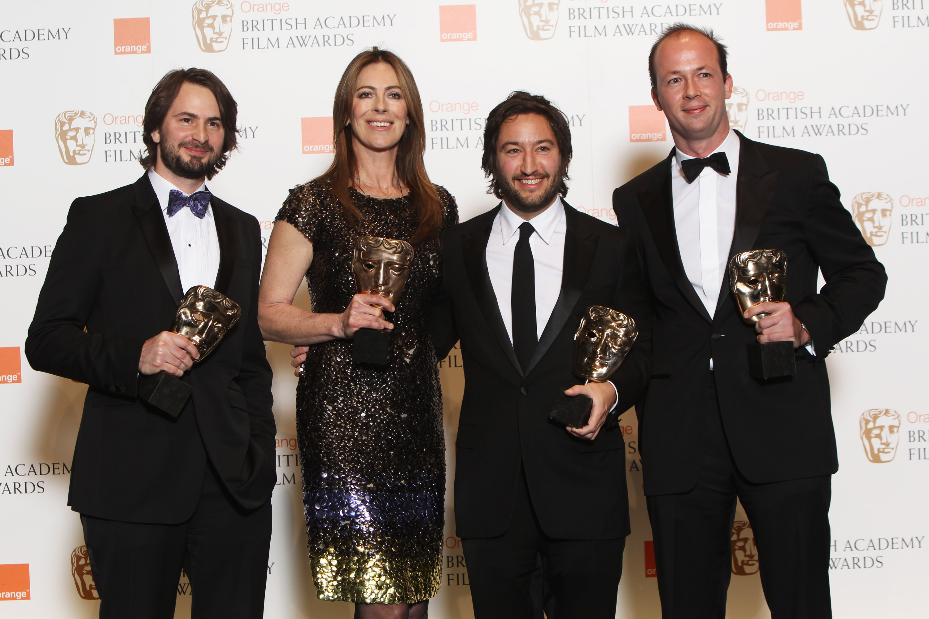 Mark Boal, Kathryn Bigelow, Niolas Chartier and Greg Shapiro celebrate their Best Film win for ‘The Hurt Locker’ at the BAFTA Awards in London, England on February 21, 2010