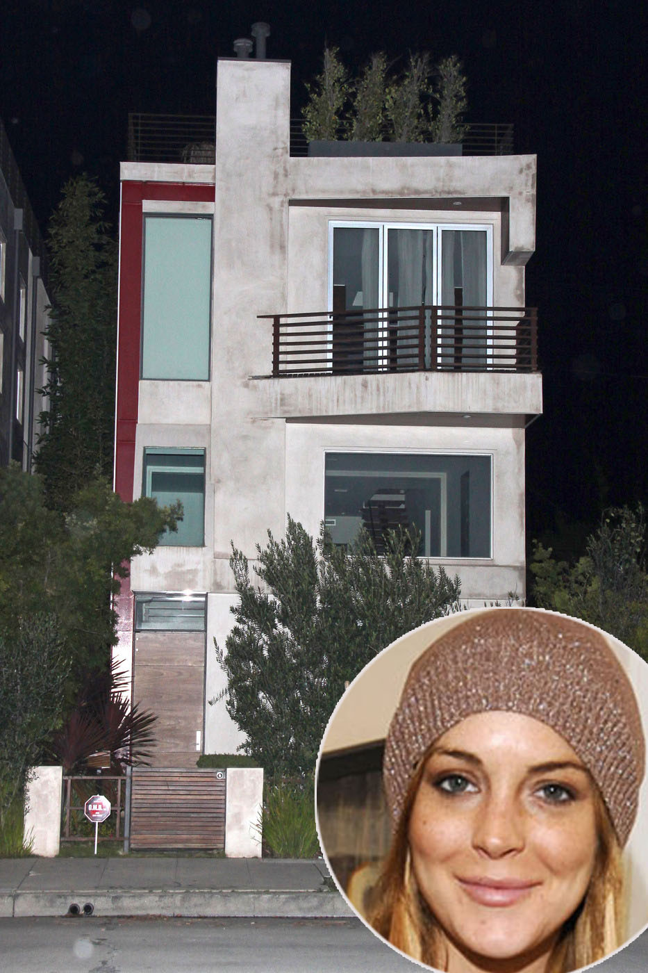 Workers move items into Lindsay Lohan’s new Venice Beach home, Dec. 3, 2010