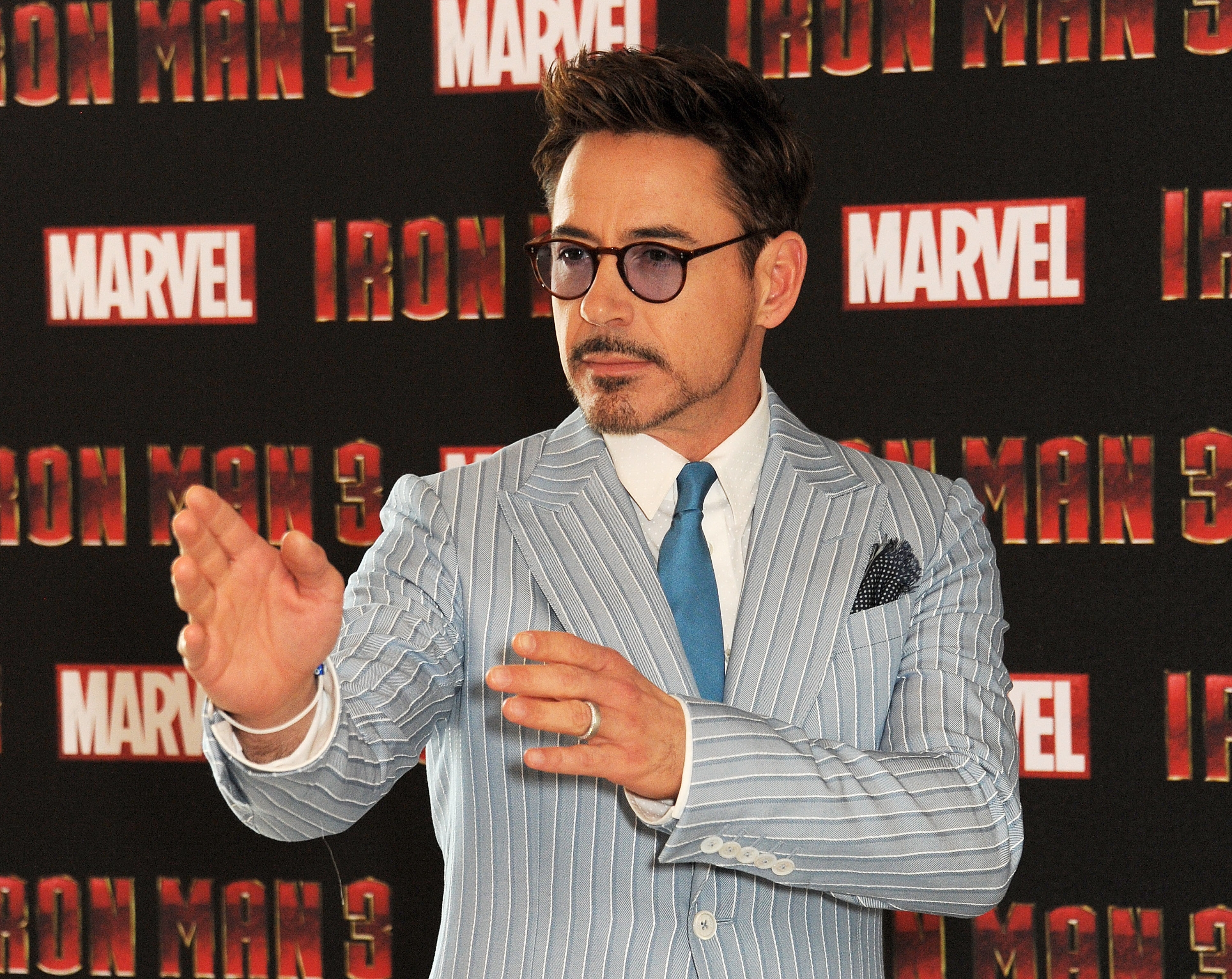 Robert Downey Jr. poses at the ‘Iron Man 3’ photocall on April 17, 2013 in London