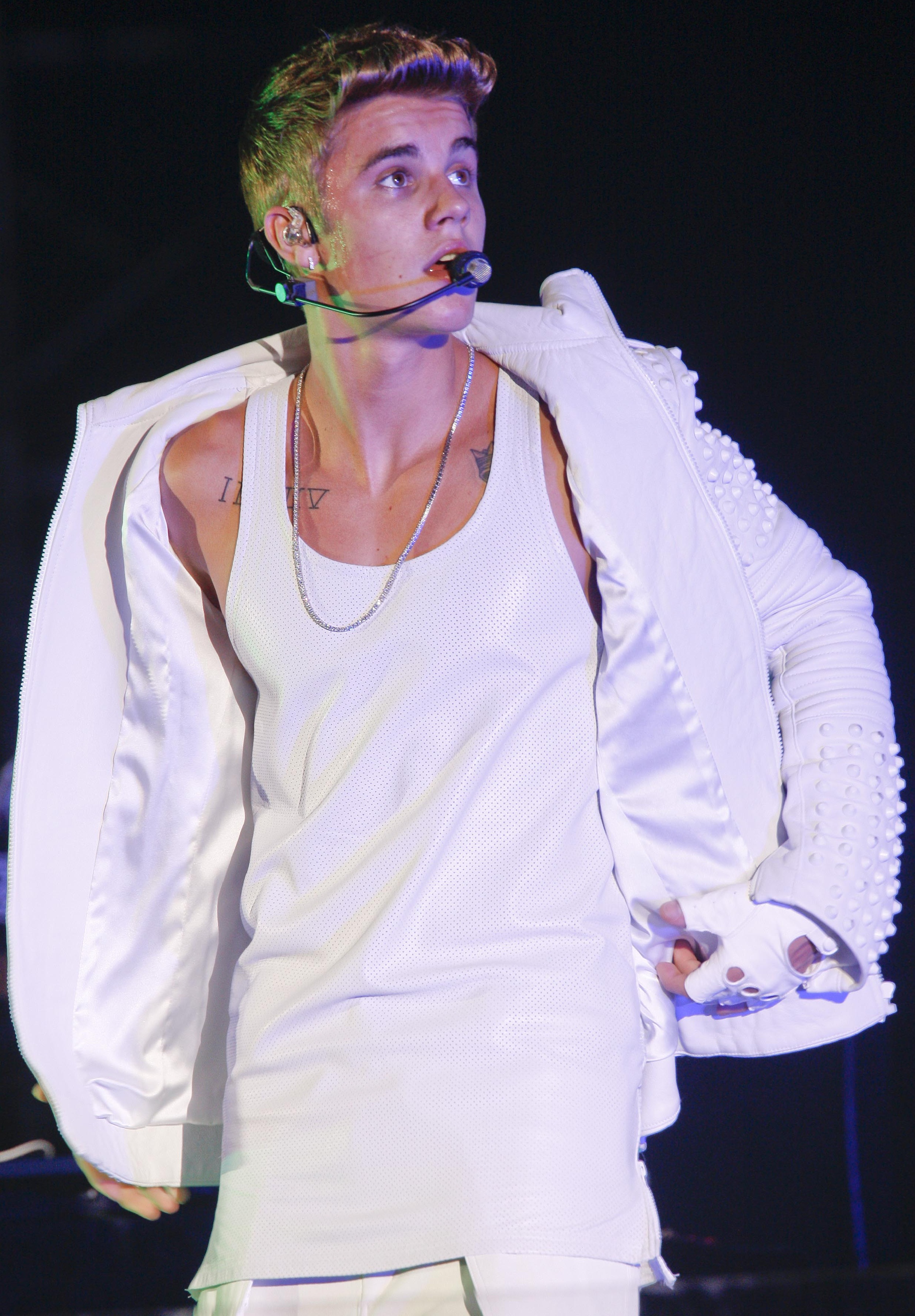 Justin Bieber performs on the stage in concert at Mercedes-Benz Arena on October 5, 2013 in Shanghai, China