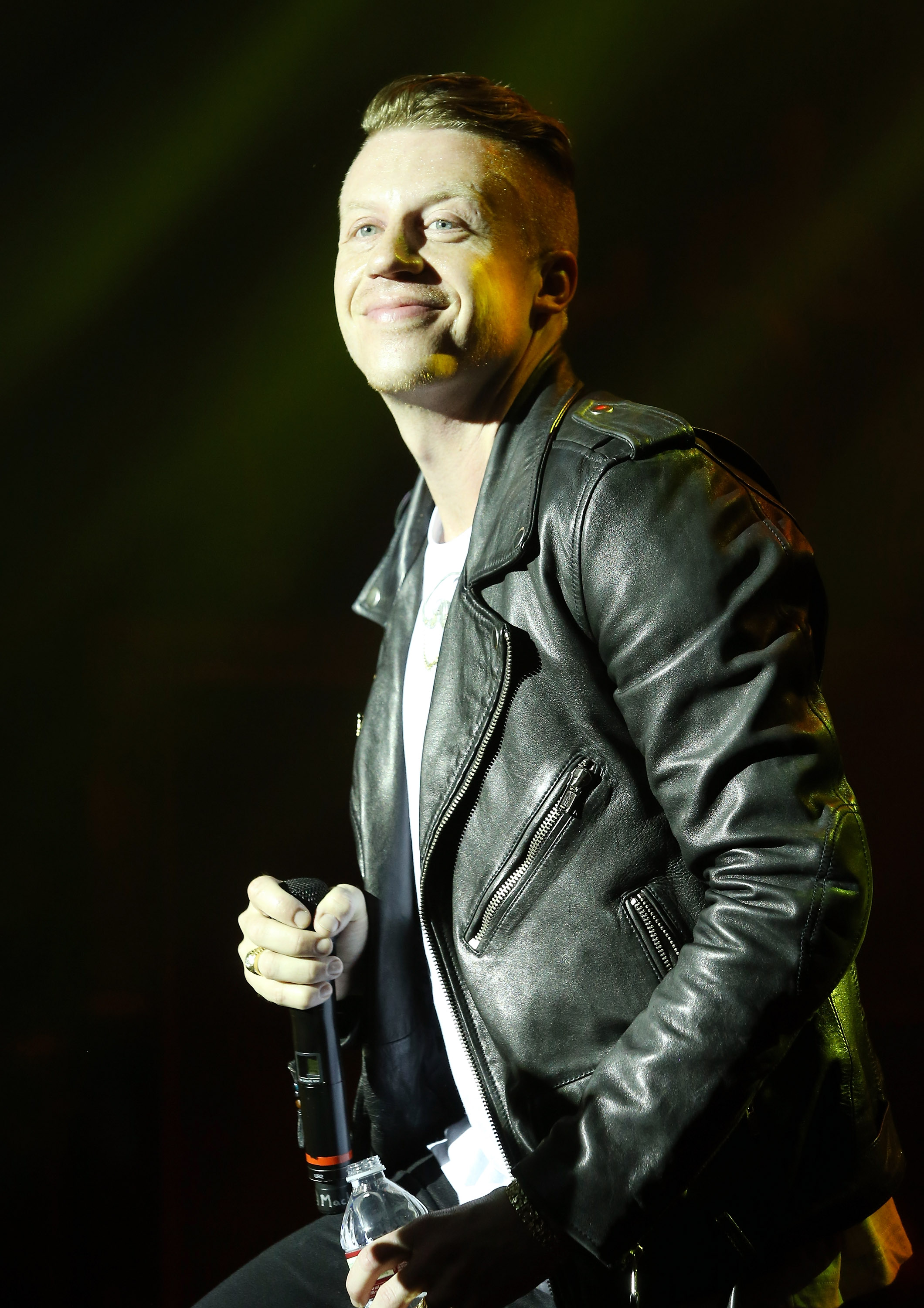 Macklemore-aka-Ben-Haggerty-performs-onstage-hosted-by-T-Mobile-held-at-Belasco-Theatre-on-January-23-2014-in-Los-Angeles