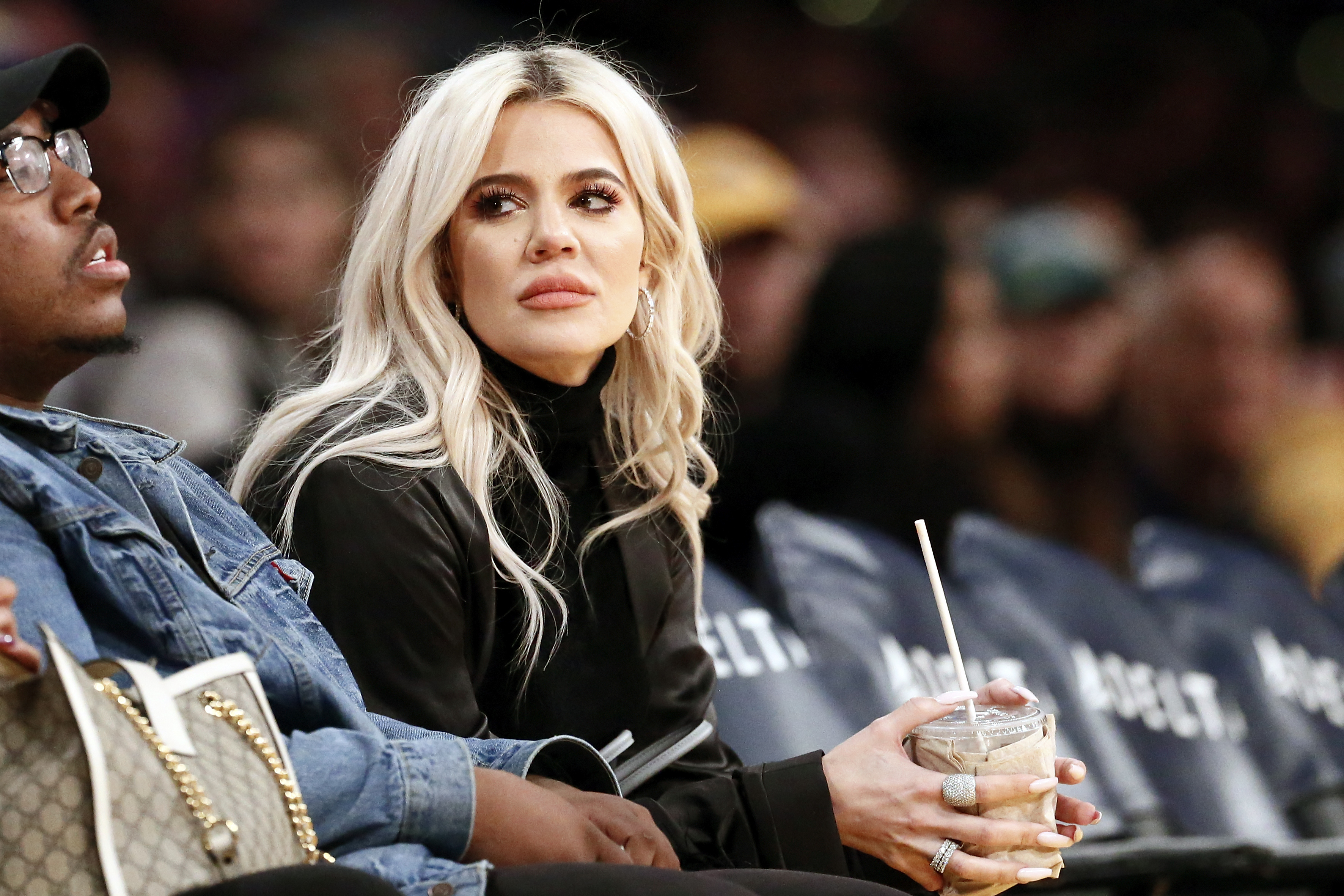 Khloé Kardashian looks on at an NBA game