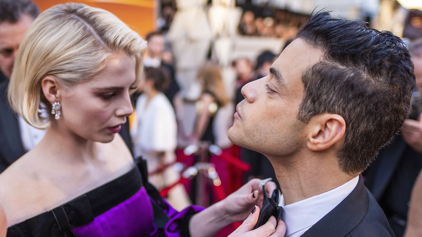 Lucy Boynton and Rami Malek arrive at the Oscars