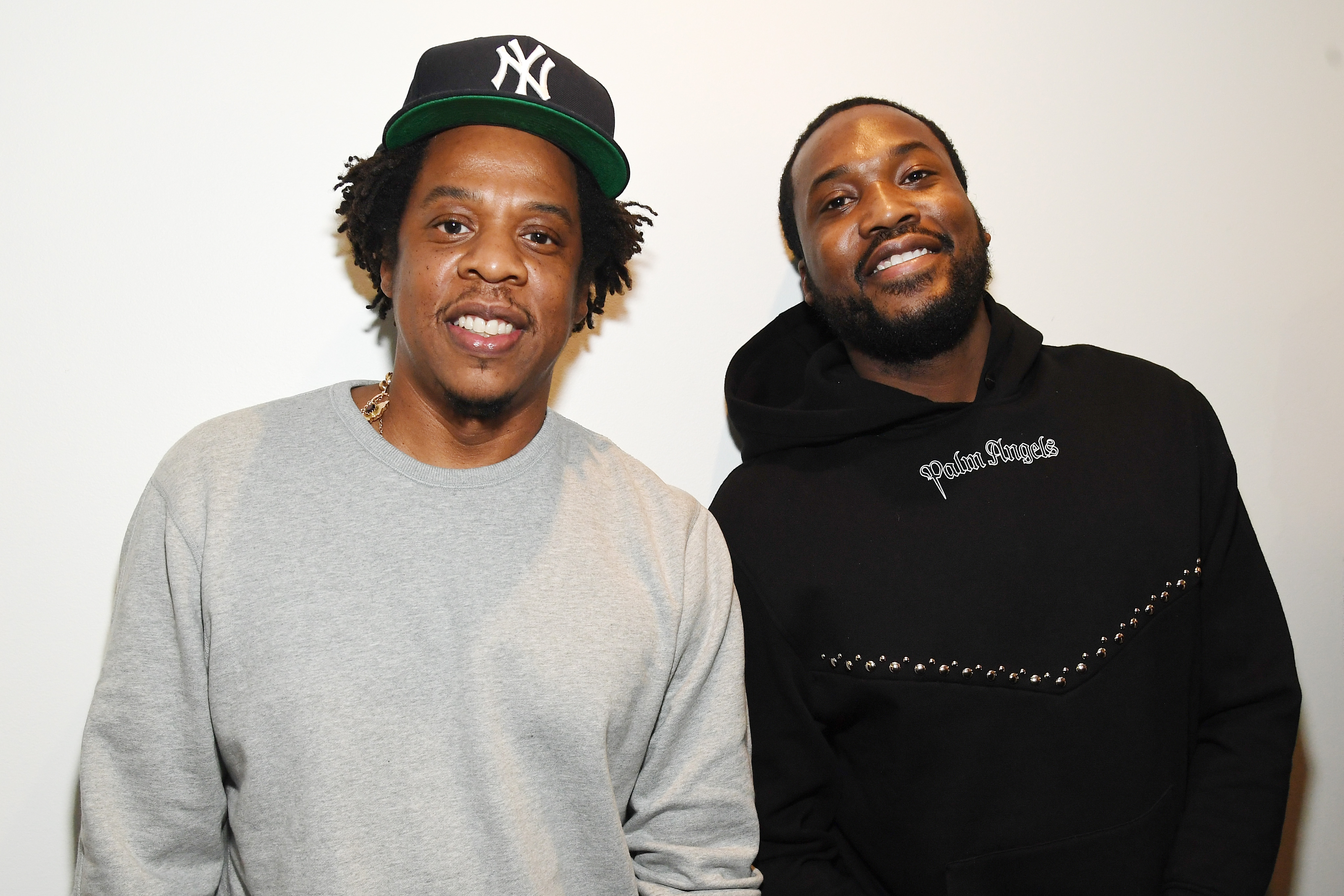 Shawn 'Jay-Z' Carter (L) and Meek Mill