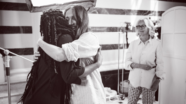 Meghan Markle Looks Overjoyed Working Behind-The-Scenes At Charity Collection Photo Shoot