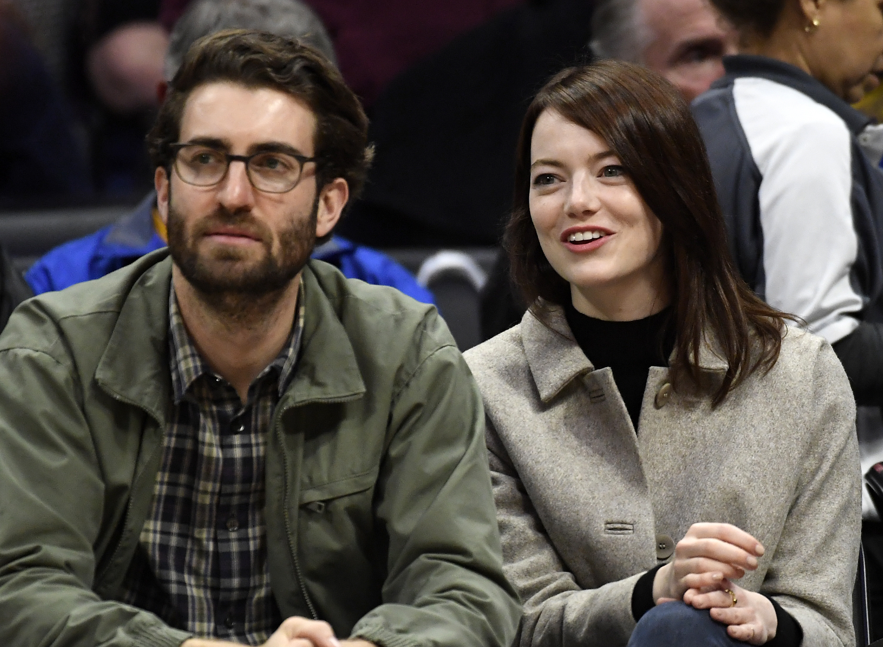 Emma Stone and Dave McCary attend the Golden State Warriors and Los Angeles Clippers basketball game at Staples Center on January 18, 2019 in Los Angeles, California. NOTE TO USER: User expressly acknowledges and agrees that, by downloading and or using this photograph, User is consenting to the terms and conditions of the Getty Images License Agreement. (Photo by Kevork Djansezian/Getty Images)