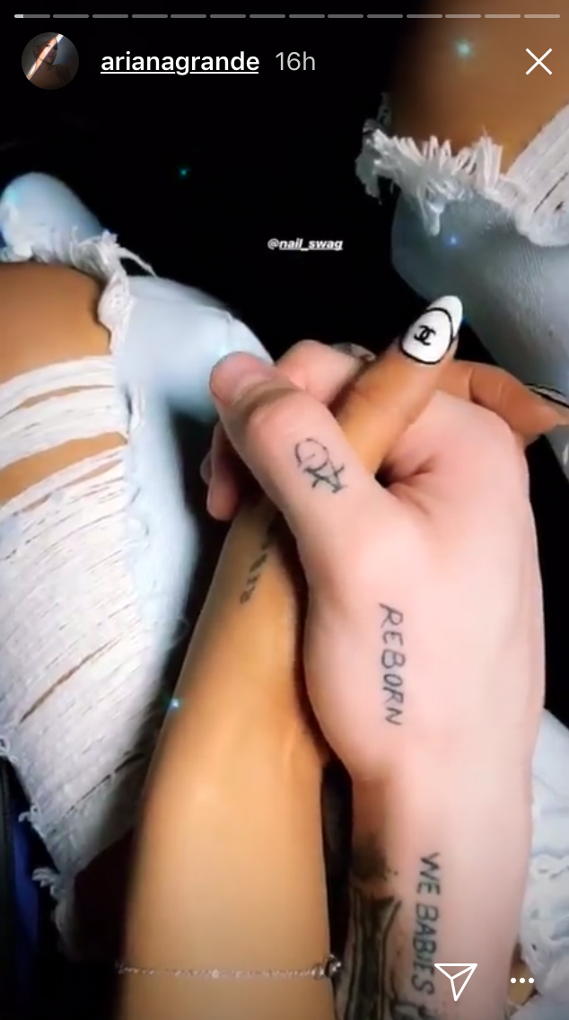 Ariana Grande and Pete Davidson hold hands in a pic from her Instagram story, July 11, 2018