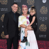 Carey Hart, Pink and daughter Willow Sage Hart arrive at the premiere of Disney's 'Alice Through The Looking Glass' at the El Capitan Theatre on May 23, 2016 in Hollywood