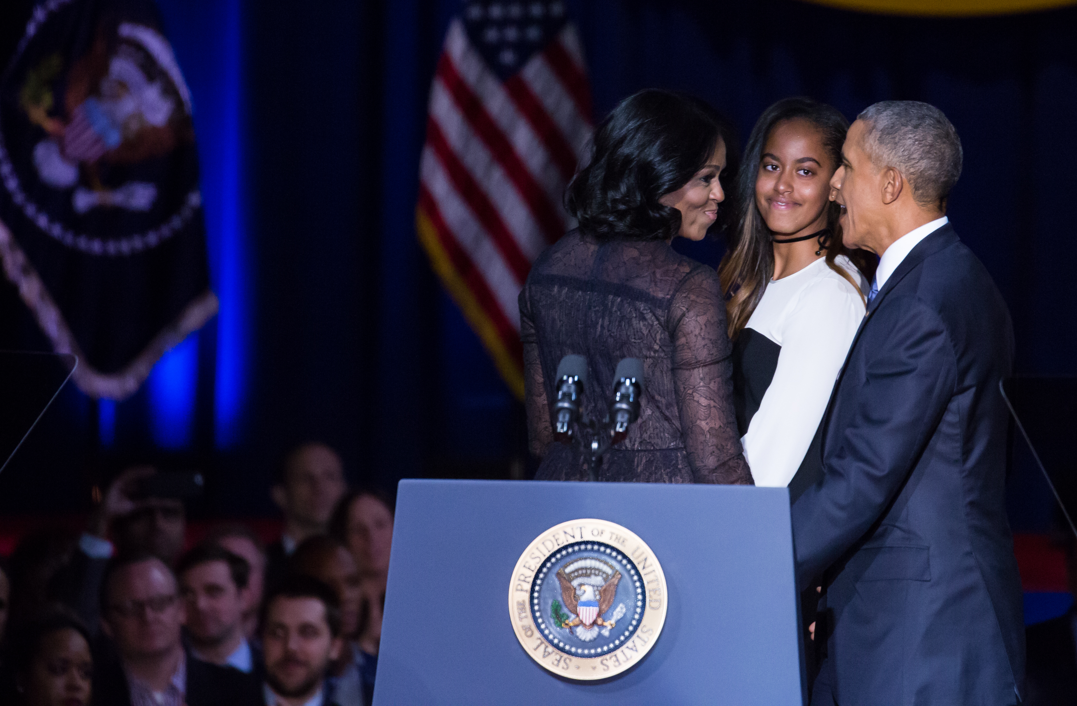 First Lady Michelle Obama, Malia, and U.S. President Barack Obama