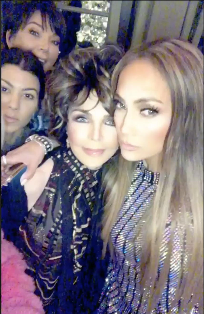 Jennifer Lopez and Joan Collins cuddle up during Taco Wednesday on Kim Kardashian’s Instagram Story