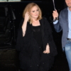 Adele is seen walking in the rain in Soho on November 19, 2015 in New York City